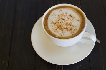 coffee cup on wood black table