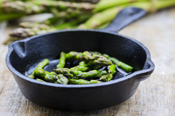 Asparagus on frying pan