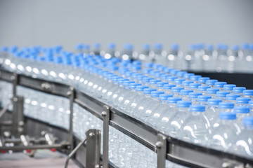 Plastic bottles on conveyor belt