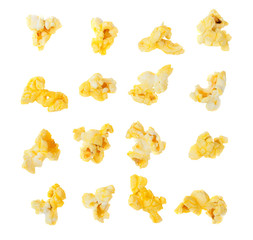 Popped kernels of pop corn snack isolated on white background.