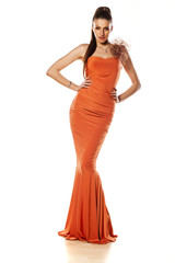 attractive girl posing in long evening dress