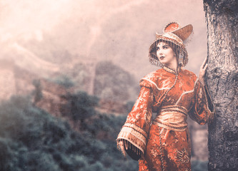 Obraz premium Woman in Chinese princess costume in the pine forest
