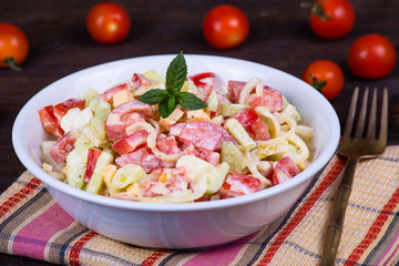 Tomato salad with cucumber and onion
