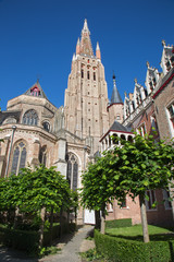 Fototapeta na wymiar Brugge - Church of Our Lady from east in morning light