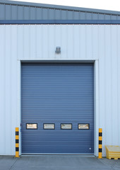 Factory loading bay roller door on industrial building