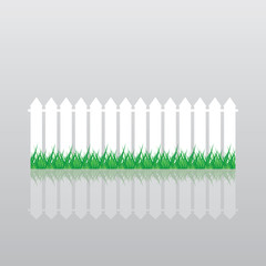 White fence and grass.