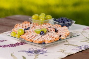 Dessert from waffles with fruits