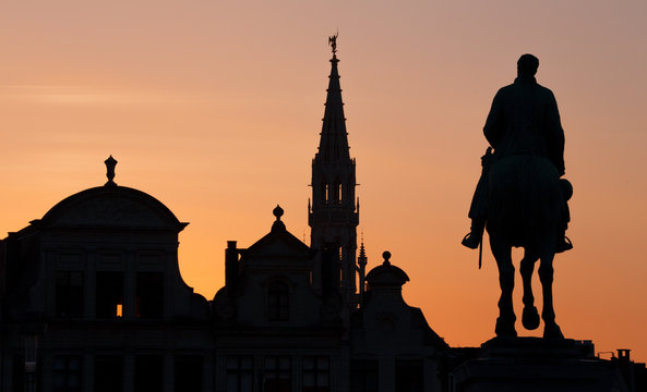 Brussels - Silhouette of king Albert statue and town hall