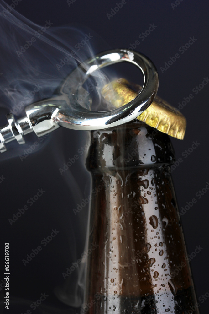 Canvas Prints top of open wet beer bottle on dark background