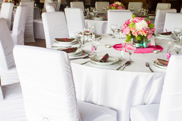 an image of tables setting at a luxury wedding hall