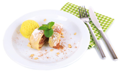 Tasty homemade strudel with mint leaves and ice-cream