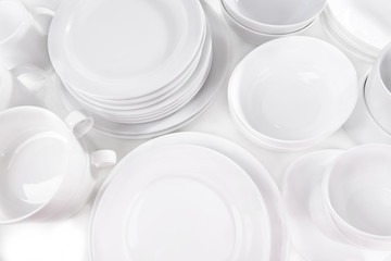 Set of white dishes close-up