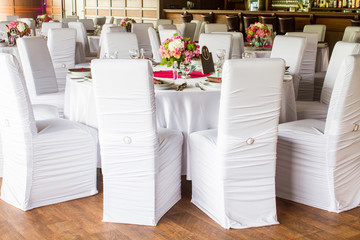 an image of tables setting at a luxury wedding hall