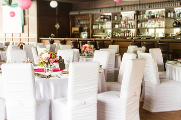 an image of tables setting at a luxury wedding hall