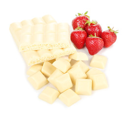 White chopped chocolate bar with fresh strawberries, isolated