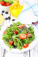 Fresh salad with arugula, close up