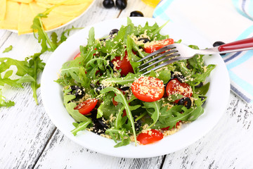 Fresh salad with arugula, close up