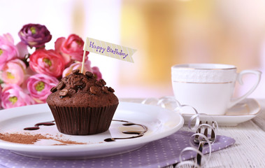Chocolate muffin with chocolate sauce