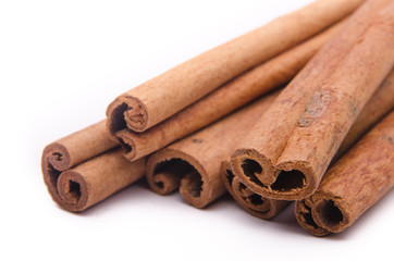 Cinnamon sticks on white background