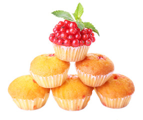 Tasty muffins with red currant isolated on white