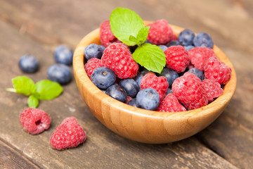 Fresh berries on a wooden table