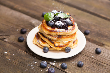 Delicious pancakes with blueberry and mint
