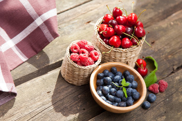 Fresh berries on a wooden table