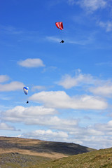 Fototapeta na wymiar paragliders over Dartmoor