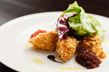 chicken nuggets with salad