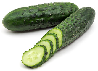 Two green cucumber on a white background