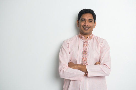 traditional indian male  portrait with plain background and copy