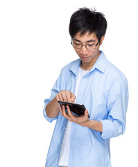 Obraz na płótnie Canvas Asian man with portable tablet