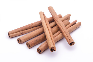 Cinnamon sticks on white background