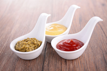 condiment, ketchup, mustard and pesto sauce