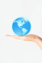 Planet earth in human hands