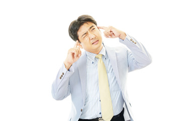 頭痛を訴えるビジネスマン