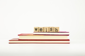 welsh language word on wood stamps and books