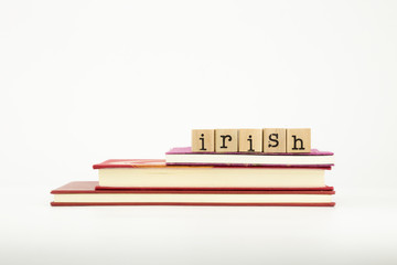 irish language word on wood stamps and books