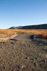 Rural Road Showing where Asphalt Ends and Gravel Begins