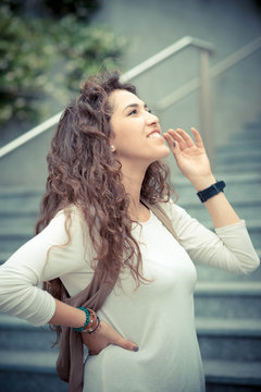 beautiful curly long brunette hair moroccan woman