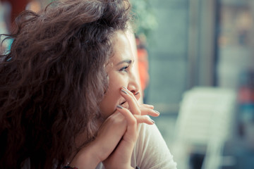 Fototapeta na wymiar beautiful curly long brunette hair moroccan woman
