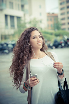 beautiful curly long brunette hair moroccan woman