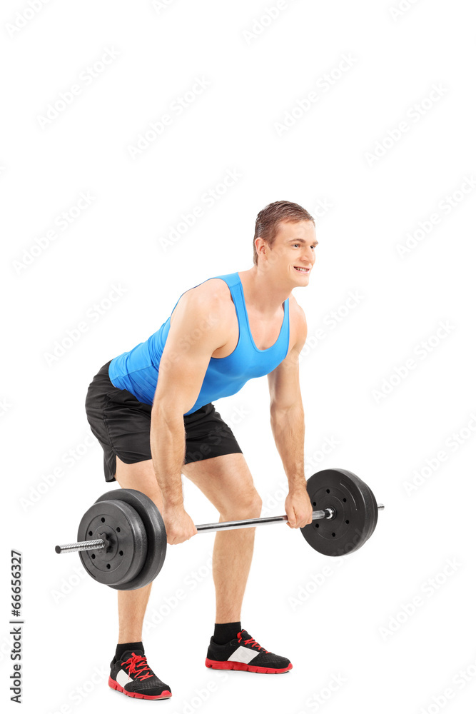 Canvas Prints Young athlete lifting a weight