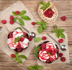 Top view of dessert with strawberry and ice cream