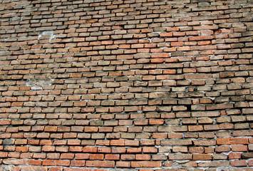 red bricks of an impassable wall ideal as textures or BACKGROUND