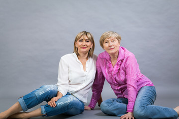 Senior lady with her middle-aged daughter