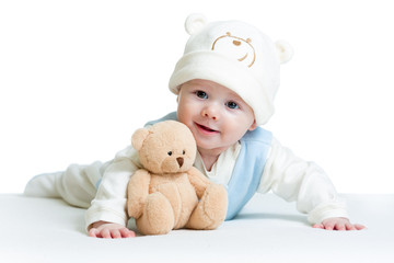cute baby weared funny hat with plush toy