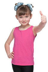 Young girl holds her thumbs up