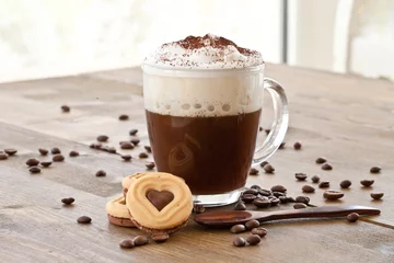 Foto op Plexiglas Eine Tasse Kaffee mit Milchschaum © scerpica
