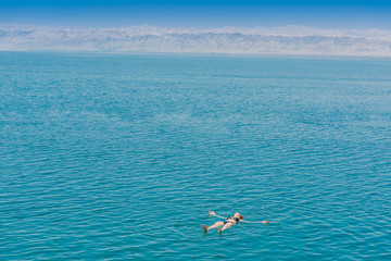 one woman swimming bathing in Dead Sea Jordan